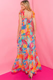 Robe longue multicolore à volants smockés et imprimé tropical vibrant