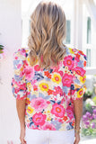 Blouse florale froncée à manches bouffantes