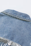 Veste en jean effet vieilli à franges ornées de sequins bleu ciel