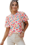 Blouse multicolore à imprimé abstrait et manches bouffantes smockées