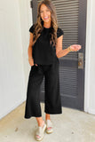 Color black Textured Knit Cap Sleeve T Shirt and Wide Leg Pants Set