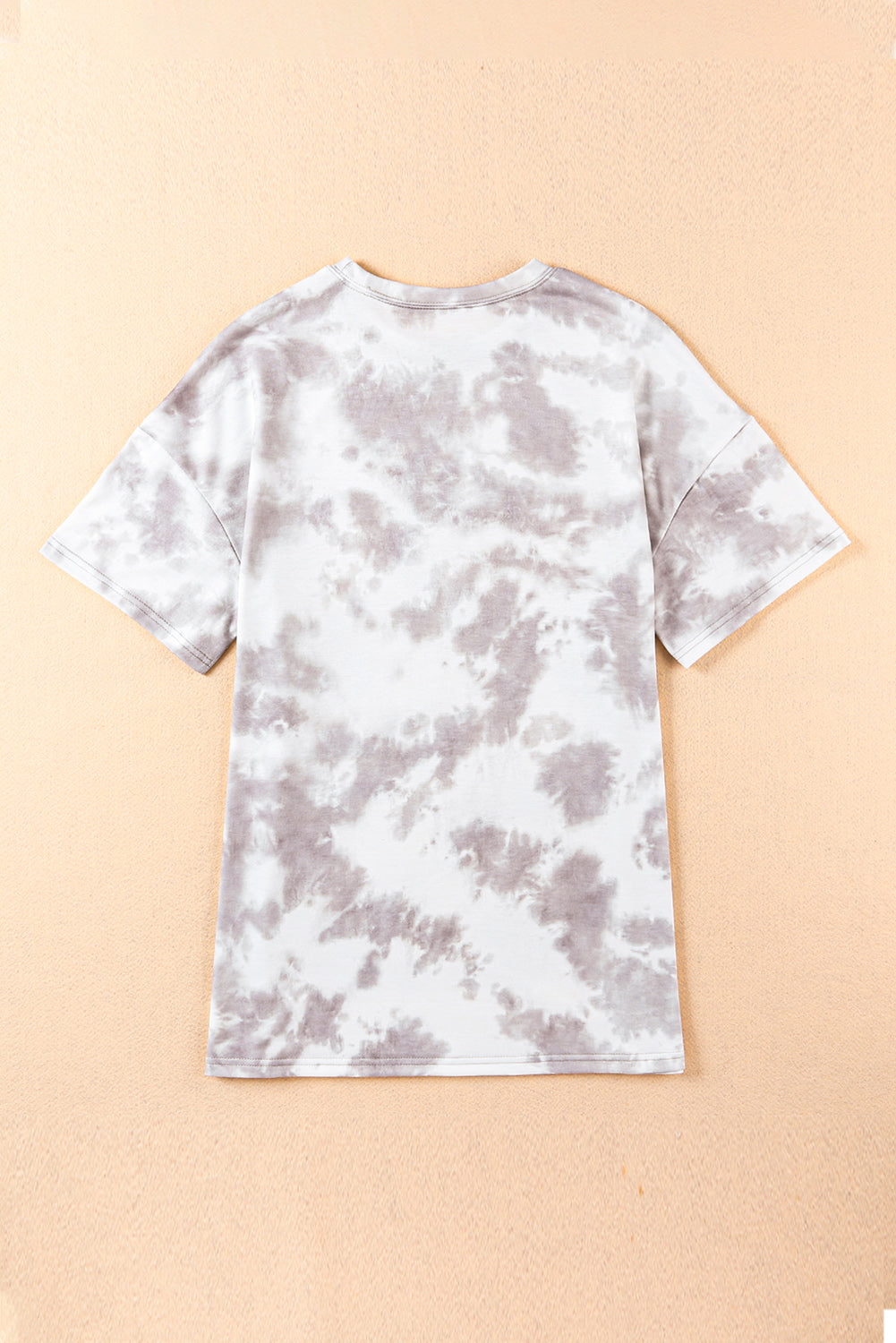 Haut blanc à manches courtes et col rond tie-dye 