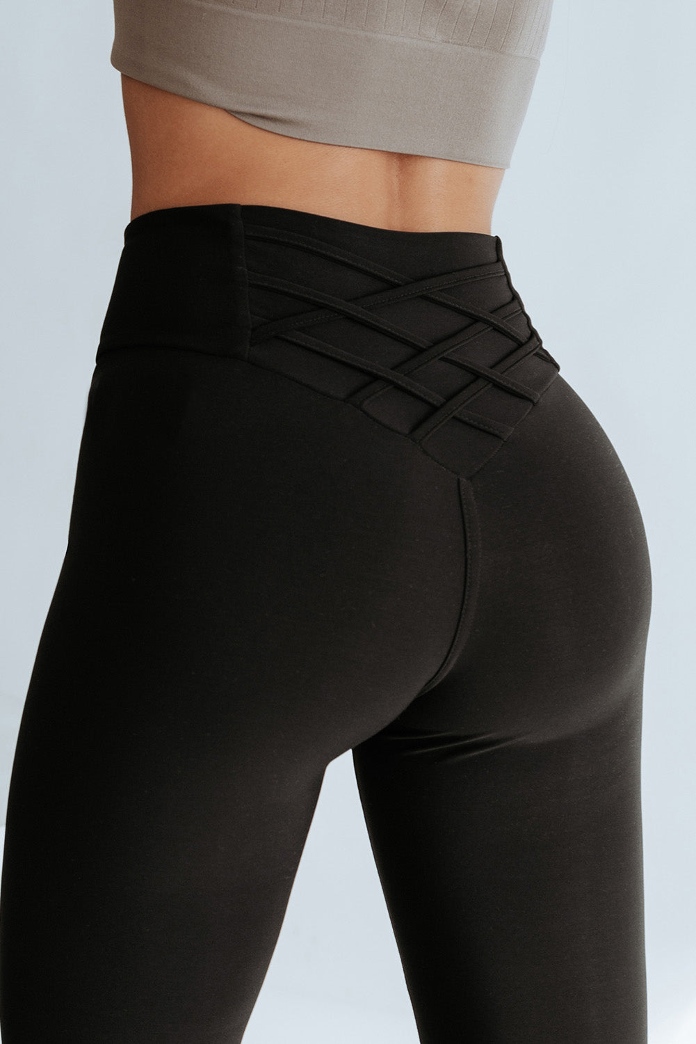 Legging taille haute noir croisé avec contrôle du ventre 