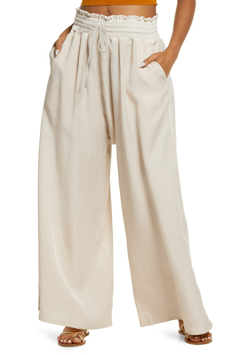 Pantalon large smocké beige taille haute 