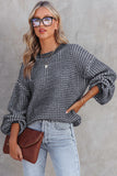 Pull bleu chiné en tricot à épaules tombantes et manches bouffantes