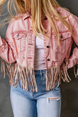 Veste en jean courte rose effet vieilli à franges