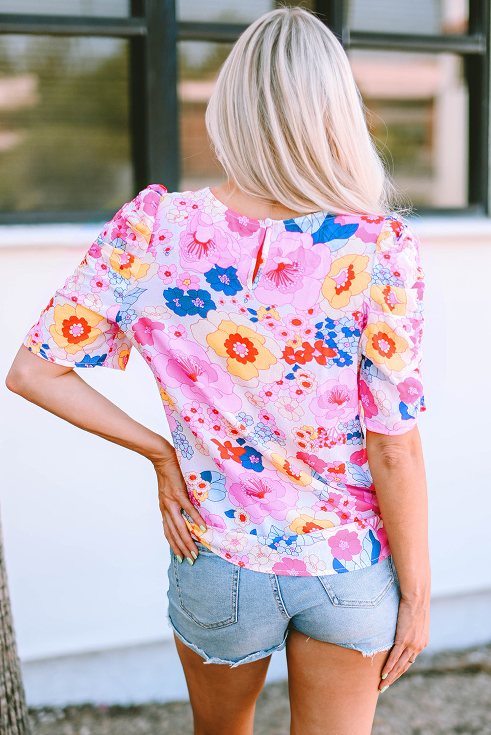 Blouse florale froncée à manches bouffantes