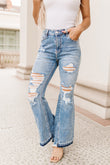 Light Wash Distressed High Rise Flare Jeans