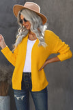 Cardigan jaune en grosse maille ouvert sur le devant