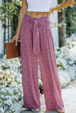 Pantalon large à petites fleurs et imprimé floral noué sur le devant 