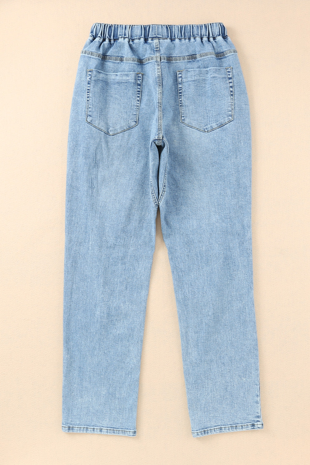 Pantalon de jogging en denim à poches rondes en détresse bleu ciel