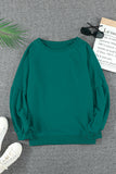 Sweat-shirt vert à manches raglan et patchwork