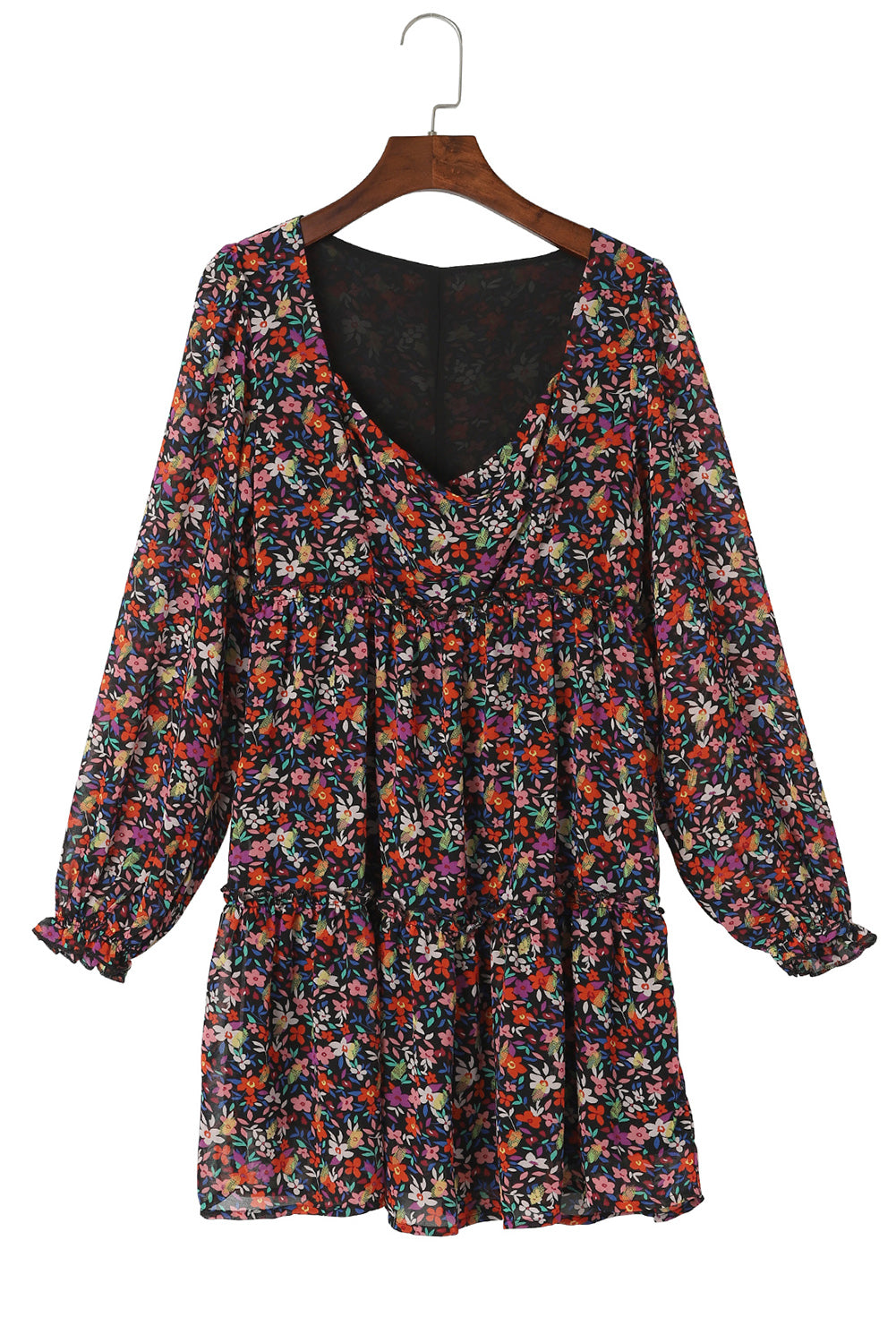 Blouse florale noire à col en V et manches bouffantes