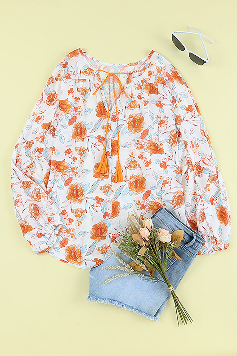 Blouse dolman orange fendue à col en V et imprimé floral 