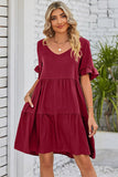 Robe midi évasée rouge à col en V et manches courtes