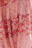 Robe rose à imprimé floral et manches bouffantes