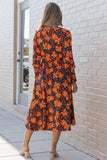 Robe portefeuille orange à imprimé floral et ceinture