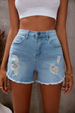 Short en jean bleu clair à ourlet effiloché