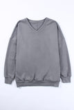 Sweat-shirt gris côtelé à col en V et épaules tombantes 