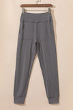 Pantalon de jogging taille haute noir avec poches et coutures apparentes