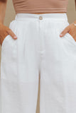 Pantalon large plissé à taille élastique de couleur unie blanc