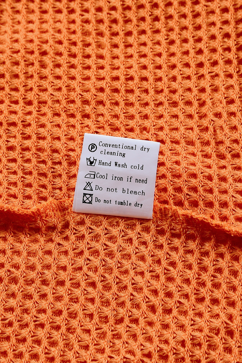 Haut en tricot gaufré color block léopard orange