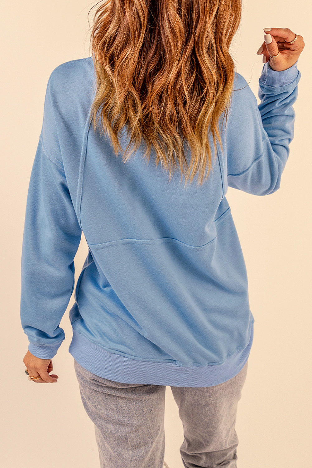 Sweat-shirt bleu ciel avec poches et demi-zip en coton