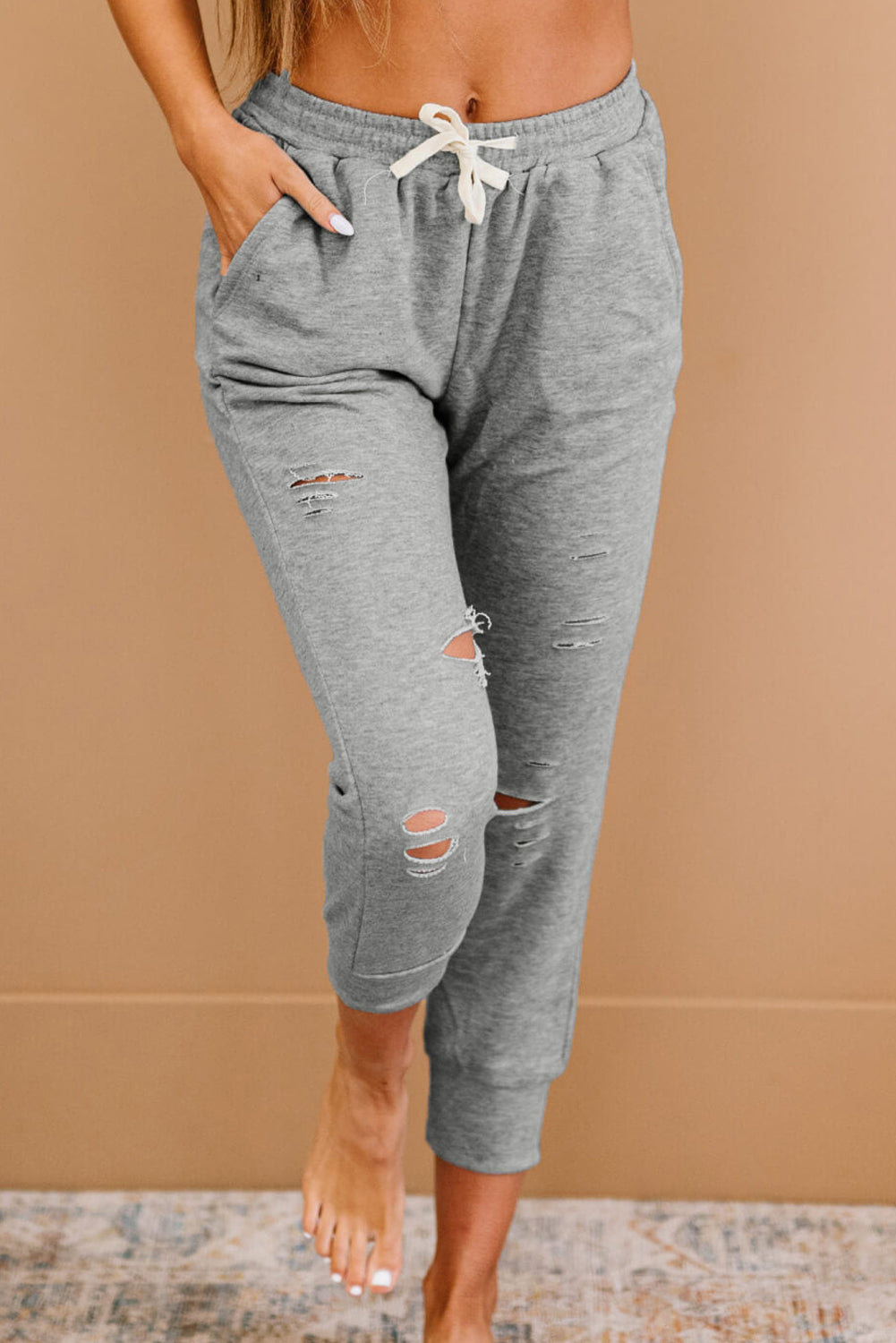 Pantalon de jogging court gris chiné effet vieilli