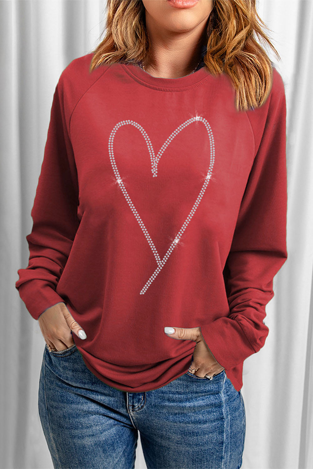 Sweat-shirt rouge uni à col rond et manches raglan 