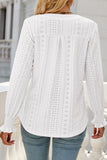 Blouse ample texturée blanche à col fendu