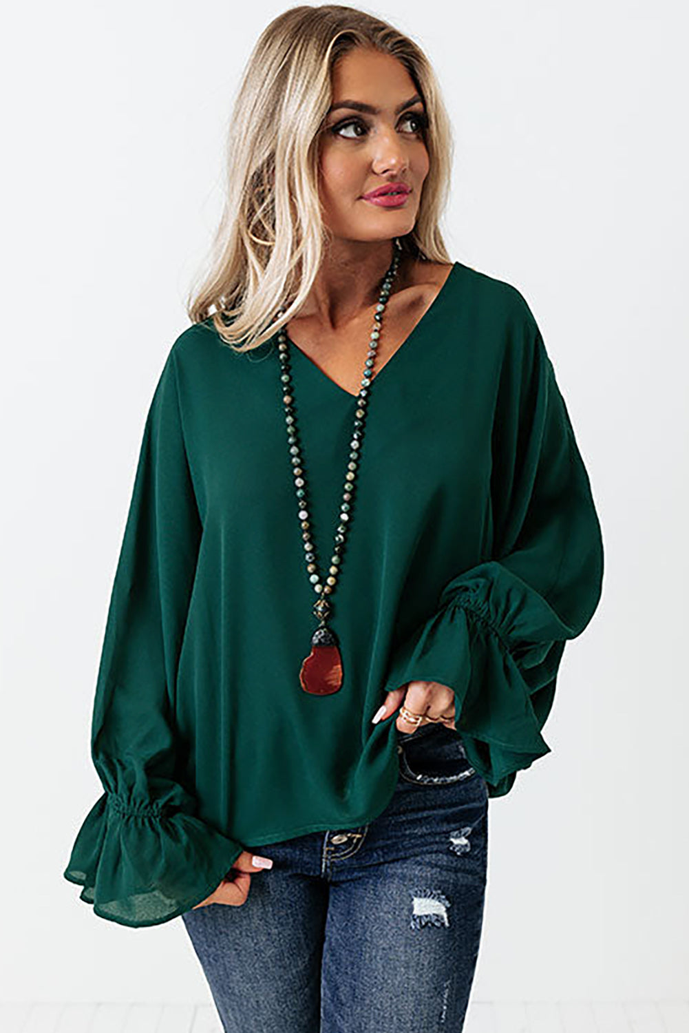 Blouse verte à manches évasées et poignets évasés 