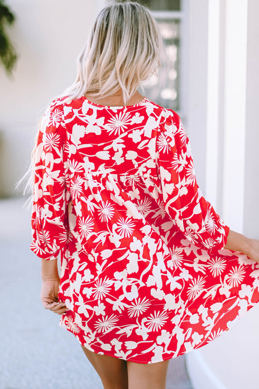 Mini-robe babydoll à imprimé floral et manches bouffantes à col fendu rouge