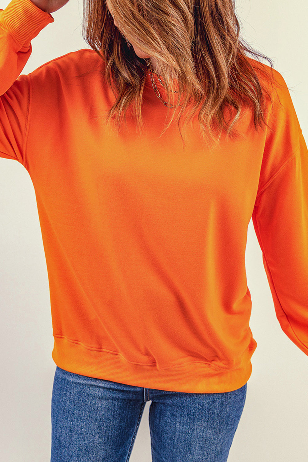 Sweat-shirt orange uni à col rond