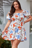 Robe évasée smockée à fleurs blanche grande taille