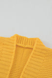 Cardigan jaune en grosse maille ouvert sur le devant