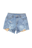 Short en jean bleu ciel à ourlet brut et insert en tricot floral