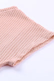 Haut en tricot gaufré rose à col large et droit