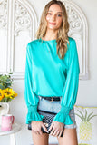 Blouse verte à manches bouffantes en satin