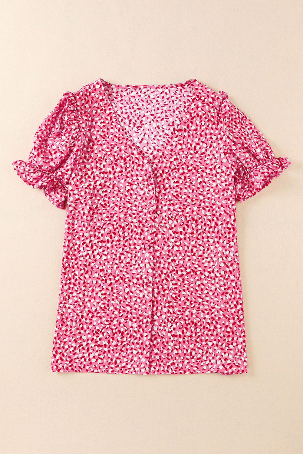 Chemise rose à manches volantées et boutonnée à imprimé abstrait