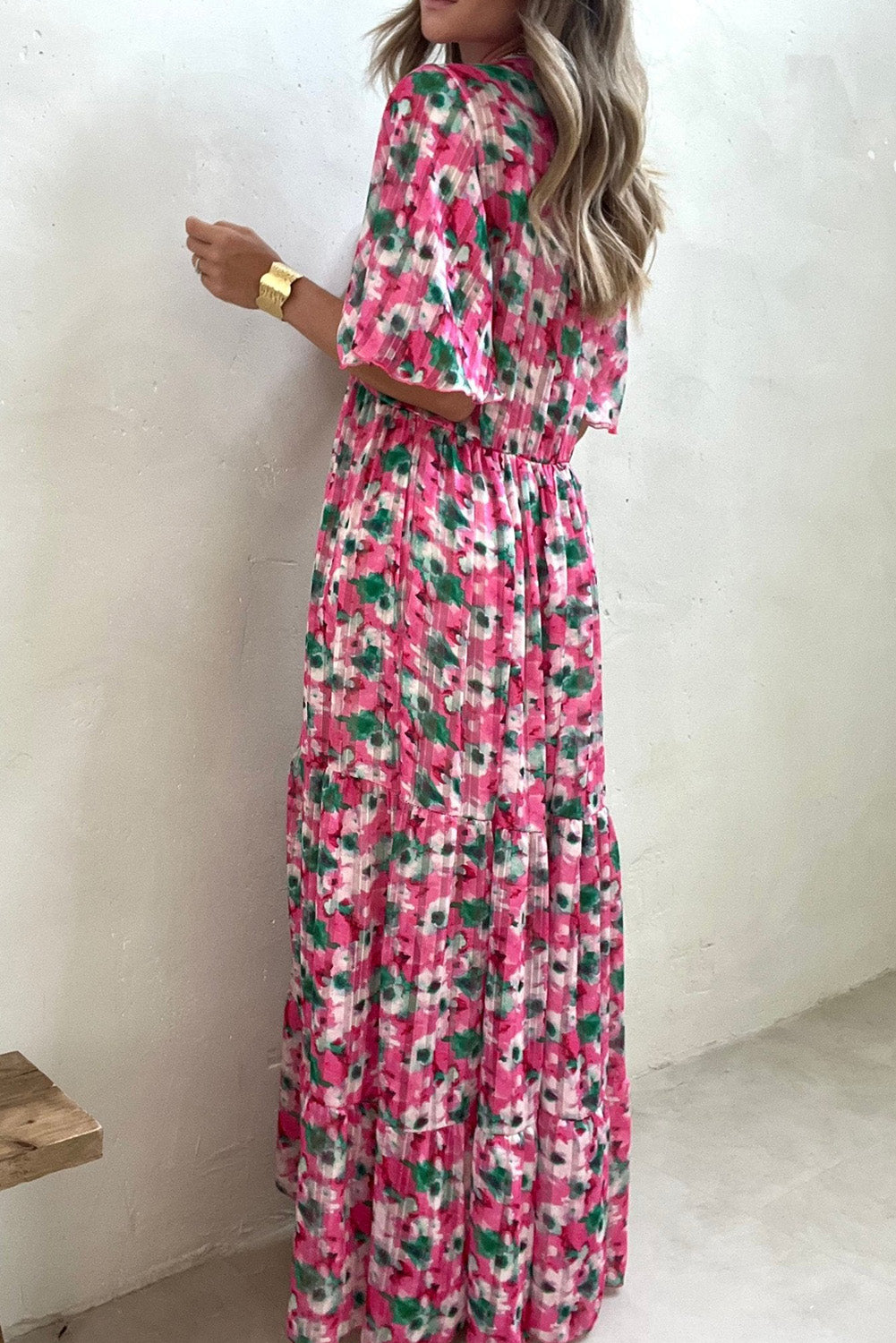 Robe longue rose à imprimé floral et manches larges