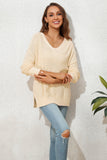 Pull beige uni flou à col en V