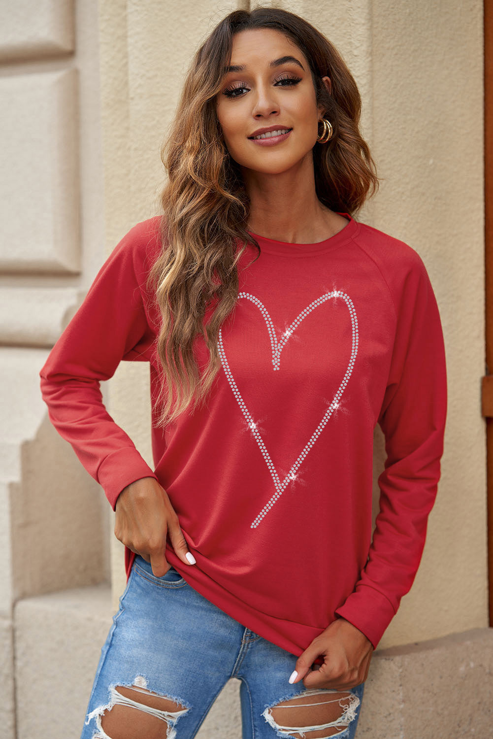 Sweat-shirt rouge uni à col rond et manches raglan 