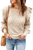 Pull beige en tricot torsadé avec épaules volantées