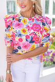 Blouse florale froncée à manches bouffantes