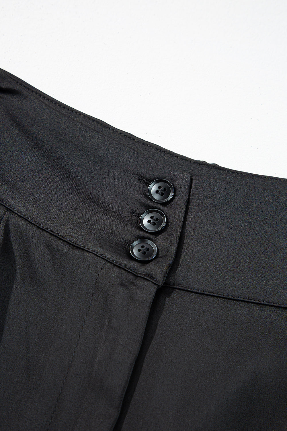 Pantalon fuselé taille haute boutonné noir