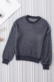 Pull bleu chiné en tricot à épaules tombantes et manches bouffantes