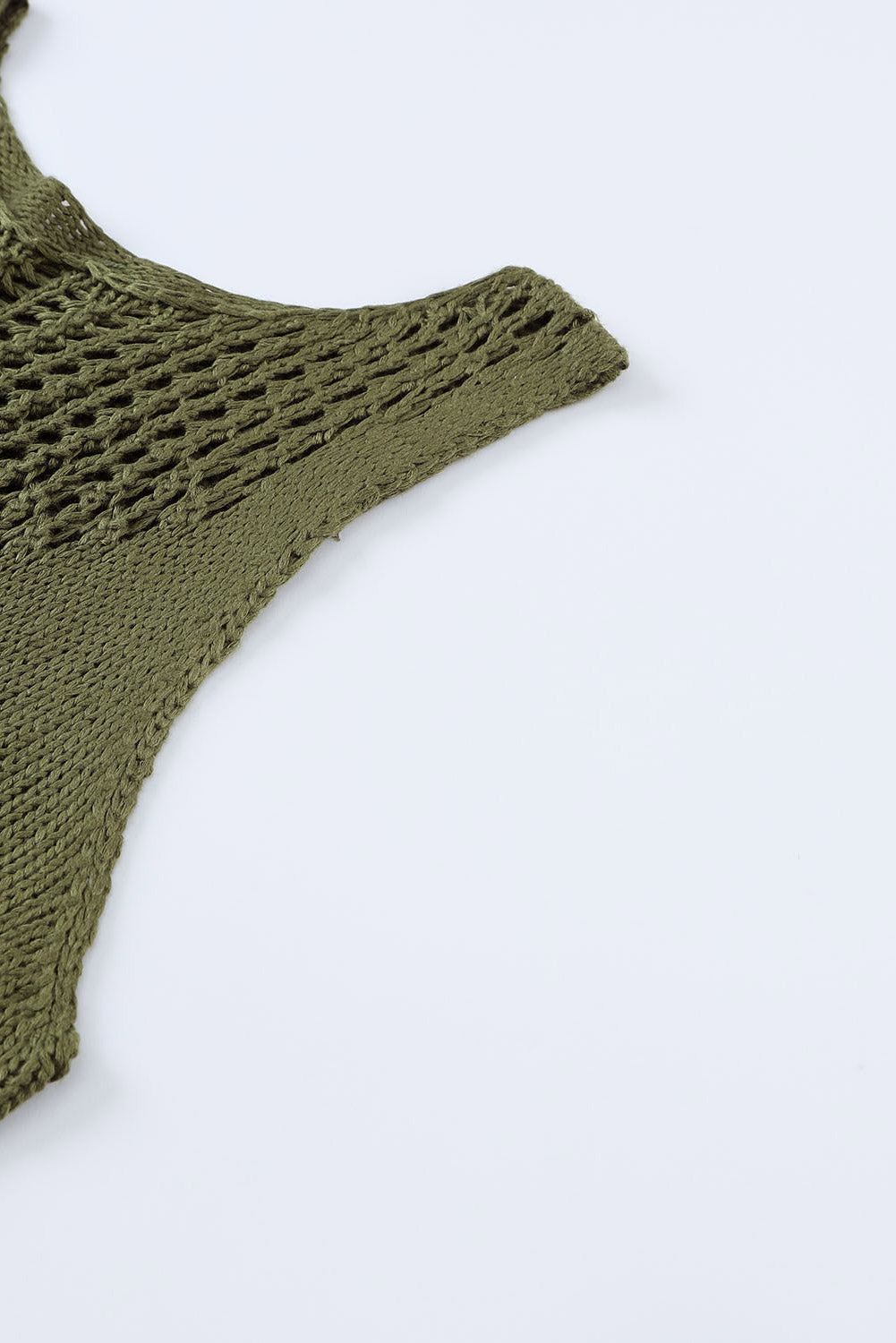 Débardeur vert en tricot ajouré au crochet à glands