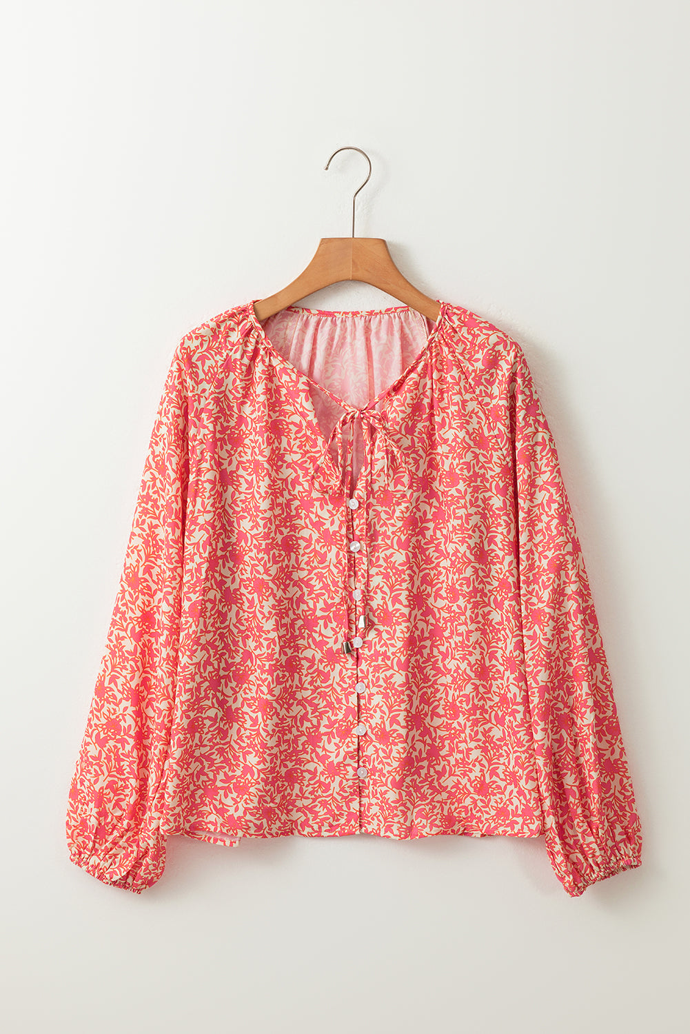 Chemise florale rose à manches bulles avec lacets