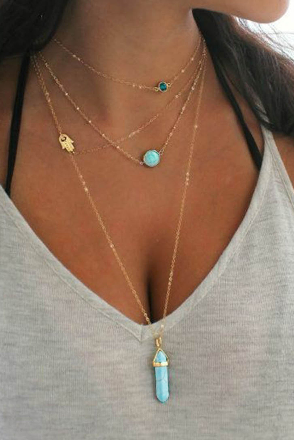 Collier multicouche avec pendentif en pierre précieuse turquoise dorée 