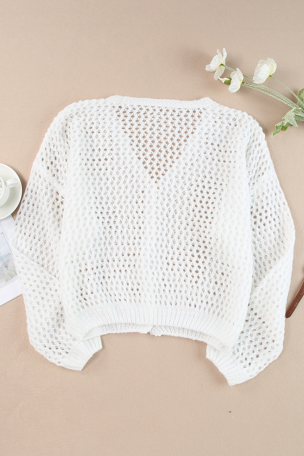 Cardigan pull blanc à manches dolman en tricot évidé